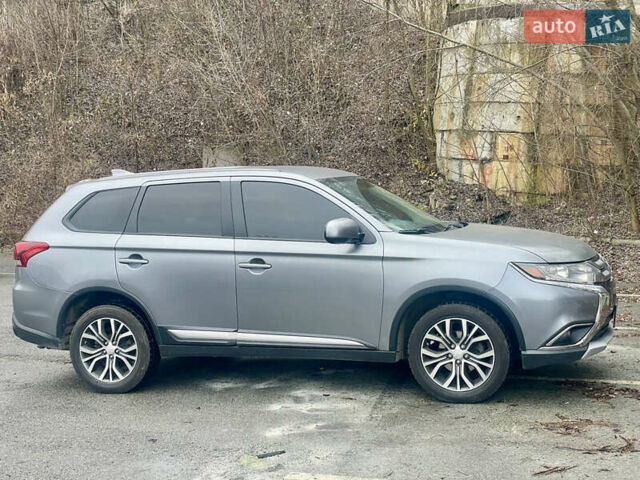 Серый Мицубиси Аутлендер, объемом двигателя 2.4 л и пробегом 213 тыс. км за 13999 $, фото 27 на Automoto.ua