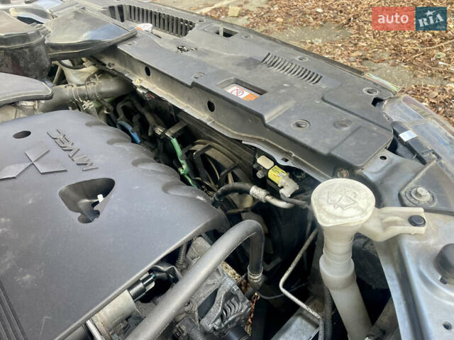 Серый Мицубиси Аутлендер, объемом двигателя 2.4 л и пробегом 213 тыс. км за 13999 $, фото 69 на Automoto.ua