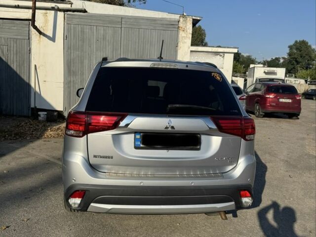 Серый Мицубиси Аутлендер, объемом двигателя 2.4 л и пробегом 125 тыс. км за 17800 $, фото 3 на Automoto.ua