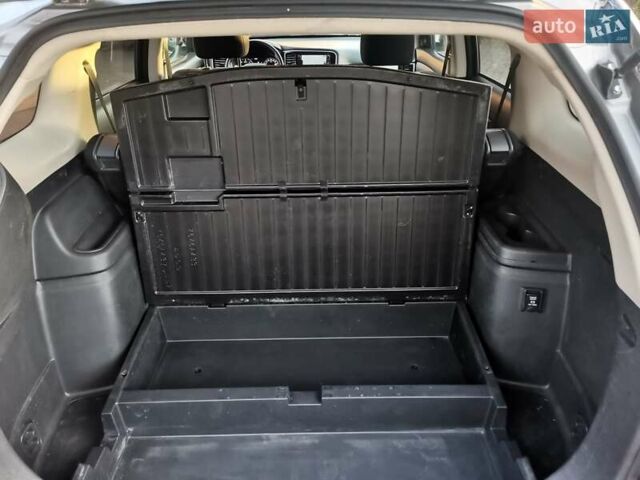 Серый Мицубиси Аутлендер, объемом двигателя 2.3 л и пробегом 130 тыс. км за 16500 $, фото 19 на Automoto.ua