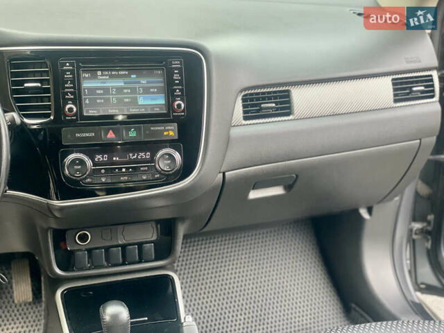 Серый Мицубиси Аутлендер, объемом двигателя 2.4 л и пробегом 213 тыс. км за 13999 $, фото 104 на Automoto.ua