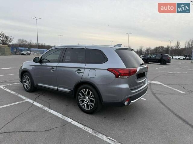 Сірий Міцубісі Аутлендер, об'ємом двигуна 2.36 л та пробігом 147 тис. км за 13200 $, фото 6 на Automoto.ua