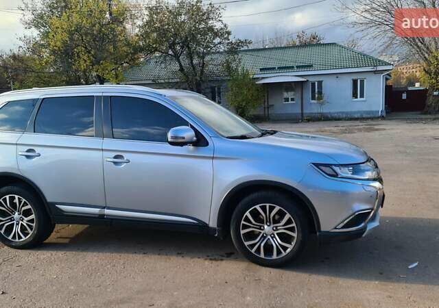 Серый Мицубиси Аутлендер, объемом двигателя 2.3 л и пробегом 253 тыс. км за 18500 $, фото 7 на Automoto.ua
