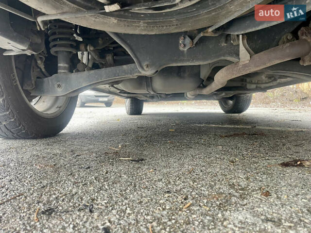 Серый Мицубиси Аутлендер, объемом двигателя 2.4 л и пробегом 213 тыс. км за 13999 $, фото 10 на Automoto.ua