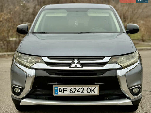 Серый Мицубиси Аутлендер, объемом двигателя 2.4 л и пробегом 148 тыс. км за 12500 $, фото 2 на Automoto.ua
