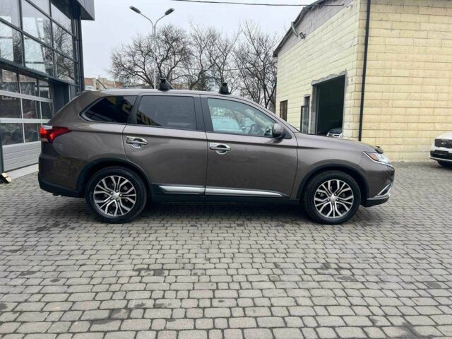 Серый Мицубиси Аутлендер, объемом двигателя 2.4 л и пробегом 160 тыс. км за 14900 $, фото 5 на Automoto.ua