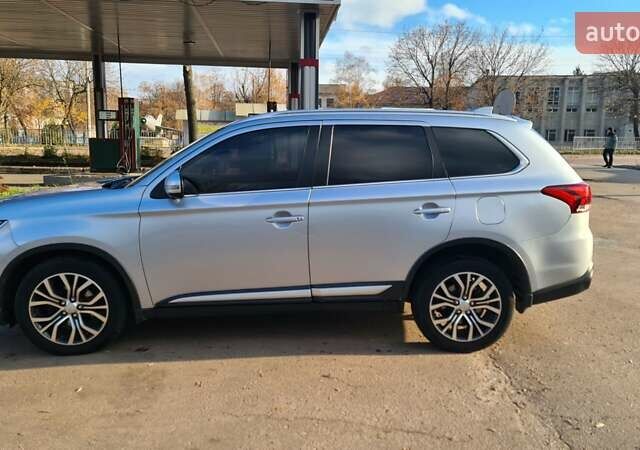 Серый Мицубиси Аутлендер, объемом двигателя 2.3 л и пробегом 253 тыс. км за 18500 $, фото 6 на Automoto.ua