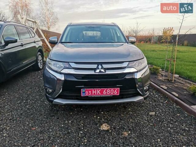 Серый Мицубиси Аутлендер, объемом двигателя 2.3 л и пробегом 130 тыс. км за 16500 $, фото 1 на Automoto.ua