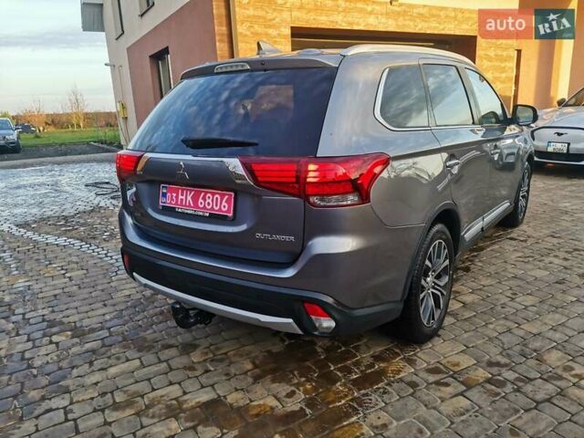 Серый Мицубиси Аутлендер, объемом двигателя 2.3 л и пробегом 130 тыс. км за 16500 $, фото 5 на Automoto.ua