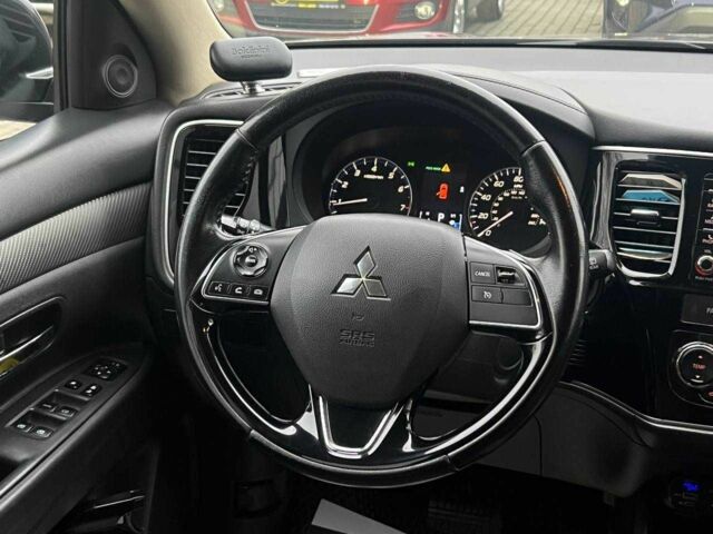 Серый Мицубиси Аутлендер, объемом двигателя 2.4 л и пробегом 160 тыс. км за 14900 $, фото 8 на Automoto.ua