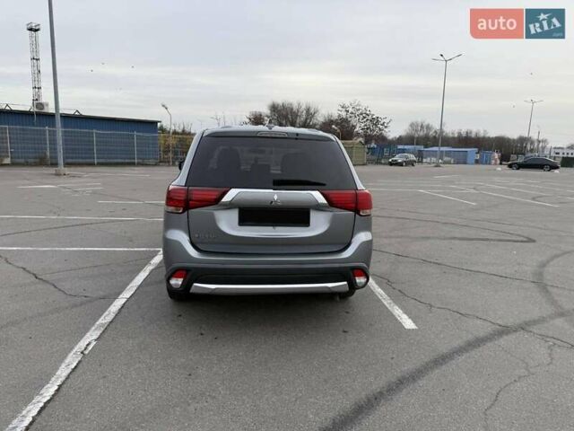 Сірий Міцубісі Аутлендер, об'ємом двигуна 2.36 л та пробігом 147 тис. км за 13200 $, фото 7 на Automoto.ua