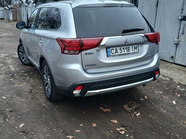 Серый Мицубиси Аутлендер, объемом двигателя 2.4 л и пробегом 250 тыс. км за 14500 $, фото 2 на Automoto.ua