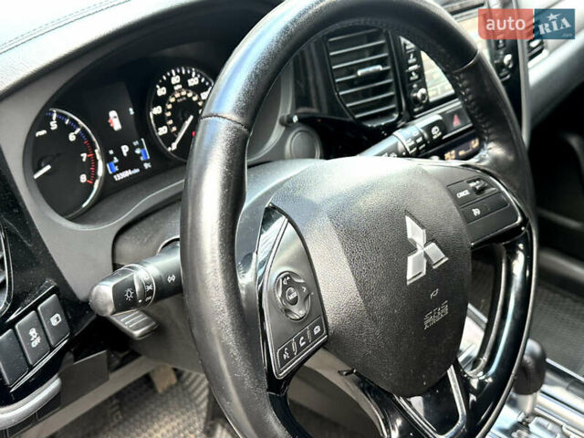 Серый Мицубиси Аутлендер, объемом двигателя 2.4 л и пробегом 213 тыс. км за 13999 $, фото 53 на Automoto.ua