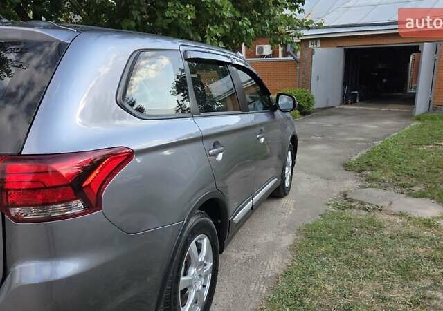 Серый Мицубиси Аутлендер, объемом двигателя 2 л и пробегом 44 тыс. км за 17900 $, фото 7 на Automoto.ua