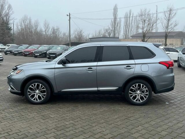 Серый Мицубиси Аутлендер, объемом двигателя 2.4 л и пробегом 205 тыс. км за 13400 $, фото 3 на Automoto.ua