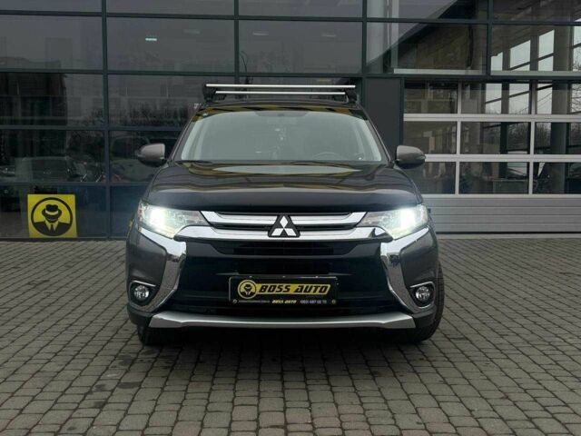 Серый Мицубиси Аутлендер, объемом двигателя 2.4 л и пробегом 160 тыс. км за 14900 $, фото 1 на Automoto.ua