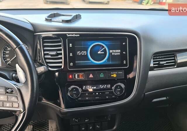 Серый Мицубиси Аутлендер, объемом двигателя 2.3 л и пробегом 253 тыс. км за 18500 $, фото 11 на Automoto.ua