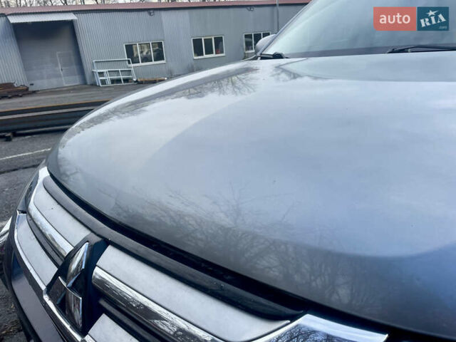 Серый Мицубиси Аутлендер, объемом двигателя 2.4 л и пробегом 213 тыс. км за 13999 $, фото 62 на Automoto.ua