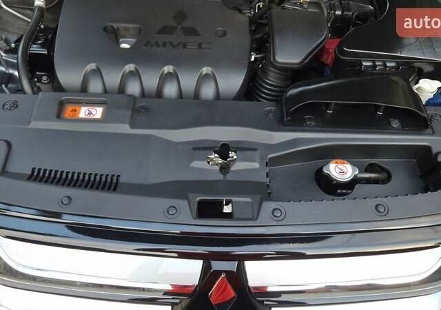 Серый Мицубиси Аутлендер, объемом двигателя 2 л и пробегом 44 тыс. км за 17900 $, фото 73 на Automoto.ua