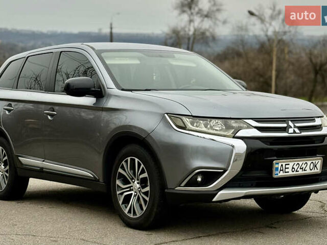 Серый Мицубиси Аутлендер, объемом двигателя 2.4 л и пробегом 148 тыс. км за 12500 $, фото 1 на Automoto.ua