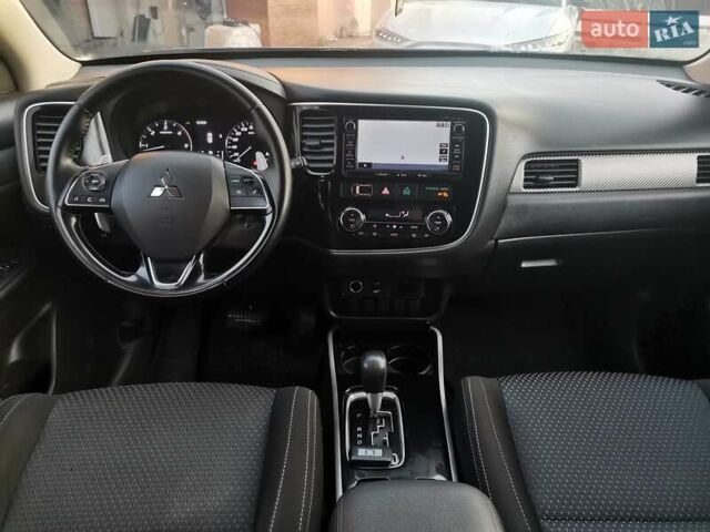 Серый Мицубиси Аутлендер, объемом двигателя 2.3 л и пробегом 130 тыс. км за 16500 $, фото 17 на Automoto.ua