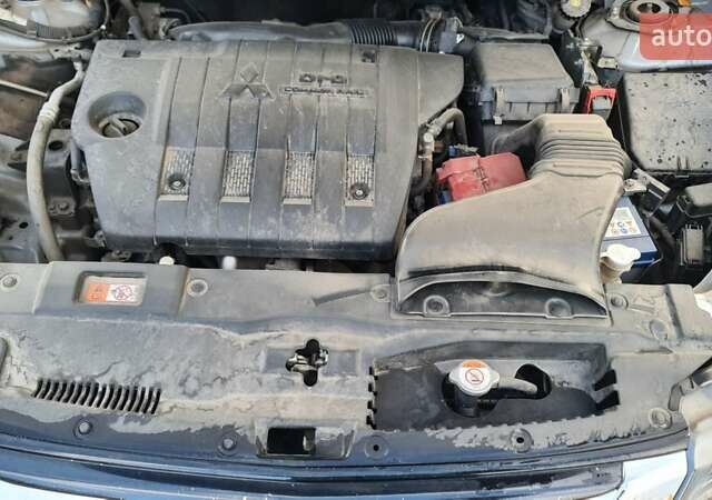 Серый Мицубиси Аутлендер, объемом двигателя 2.3 л и пробегом 253 тыс. км за 18500 $, фото 15 на Automoto.ua