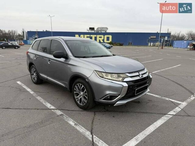 Сірий Міцубісі Аутлендер, об'ємом двигуна 2.36 л та пробігом 147 тис. км за 13200 $, фото 4 на Automoto.ua