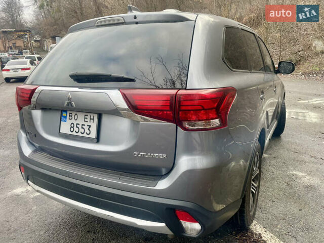 Серый Мицубиси Аутлендер, объемом двигателя 2.4 л и пробегом 213 тыс. км за 13999 $, фото 3 на Automoto.ua