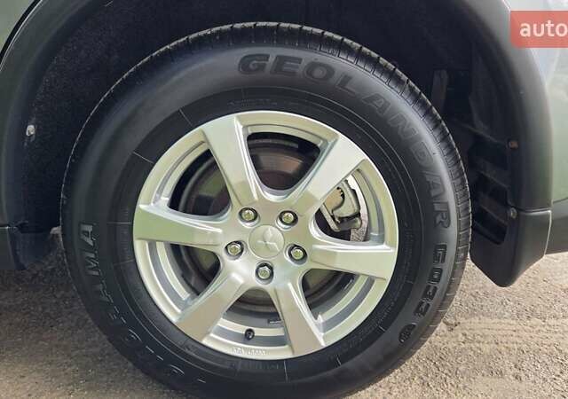 Серый Мицубиси Аутлендер, объемом двигателя 2 л и пробегом 44 тыс. км за 17900 $, фото 9 на Automoto.ua