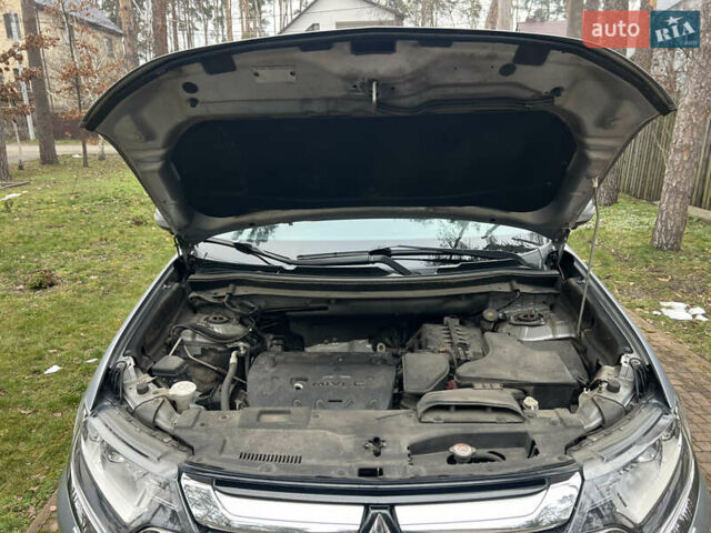 Серый Мицубиси Аутлендер, объемом двигателя 2.4 л и пробегом 189 тыс. км за 16950 $, фото 37 на Automoto.ua