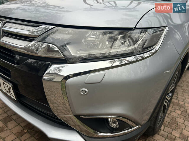 Серый Мицубиси Аутлендер, объемом двигателя 2.4 л и пробегом 189 тыс. км за 16950 $, фото 129 на Automoto.ua