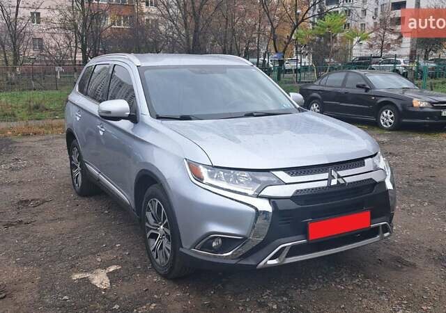 Серый Мицубиси Аутлендер, объемом двигателя 2.36 л и пробегом 120 тыс. км за 16100 $, фото 33 на Automoto.ua