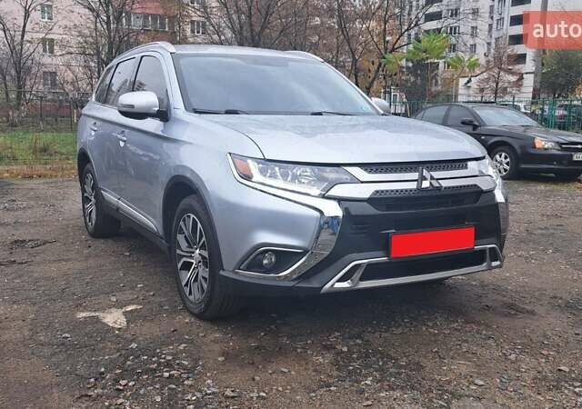 Серый Мицубиси Аутлендер, объемом двигателя 2.36 л и пробегом 120 тыс. км за 16100 $, фото 32 на Automoto.ua