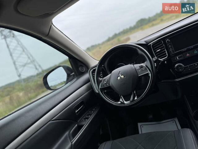 Серый Мицубиси Аутлендер, объемом двигателя 2.2 л и пробегом 152 тыс. км за 17500 $, фото 79 на Automoto.ua