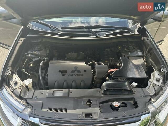 Серый Мицубиси Аутлендер, объемом двигателя 2.36 л и пробегом 85 тыс. км за 17500 $, фото 29 на Automoto.ua