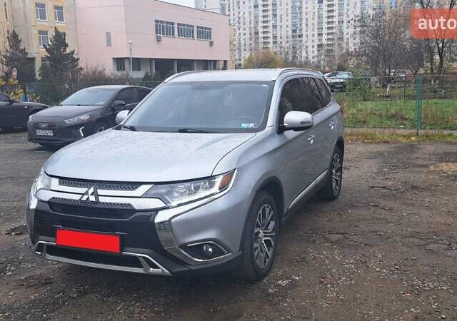 Серый Мицубиси Аутлендер, объемом двигателя 2.36 л и пробегом 120 тыс. км за 16100 $, фото 30 на Automoto.ua