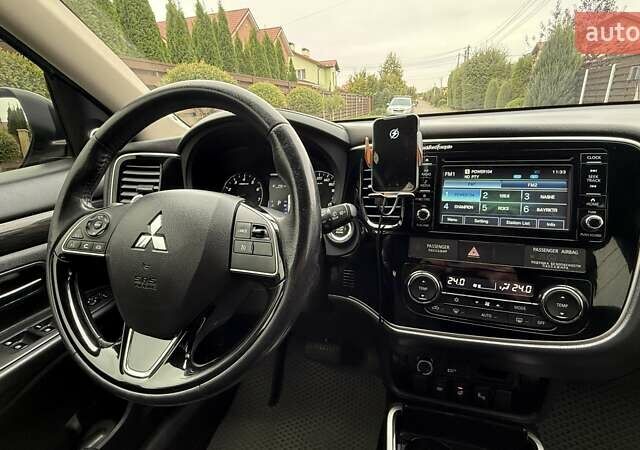 Серый Мицубиси Аутлендер, объемом двигателя 2.36 л и пробегом 153 тыс. км за 16950 $, фото 4 на Automoto.ua