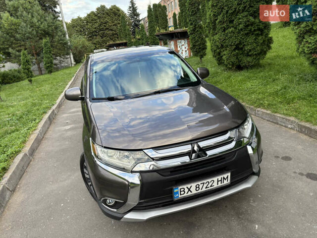 Сірий Міцубісі Аутлендер, об'ємом двигуна 2.4 л та пробігом 160 тис. км за 14999 $, фото 1 на Automoto.ua