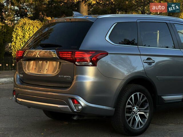 Серый Мицубиси Аутлендер, объемом двигателя 2.4 л и пробегом 167 тыс. км за 15999 $, фото 7 на Automoto.ua