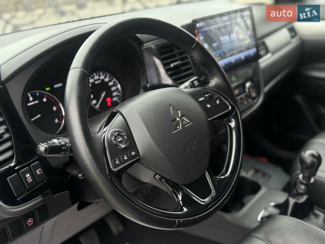 Серый Мицубиси Аутлендер, объемом двигателя 2.2 л и пробегом 152 тыс. км за 17800 $, фото 48 на Automoto.ua