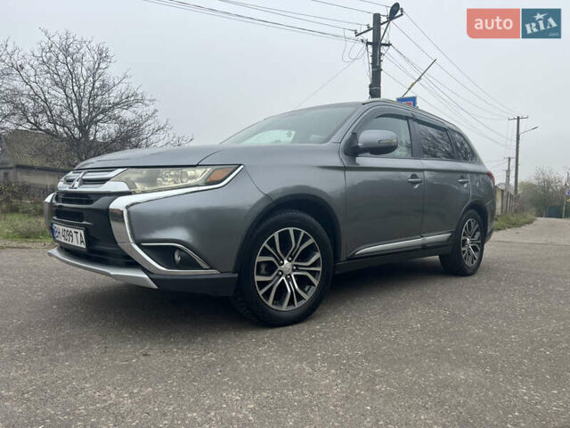 Серый Мицубиси Аутлендер, объемом двигателя 2.36 л и пробегом 85 тыс. км за 15500 $, фото 1 на Automoto.ua