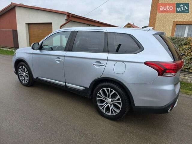 Серый Мицубиси Аутлендер, объемом двигателя 2.36 л и пробегом 170 тыс. км за 13800 $, фото 5 на Automoto.ua