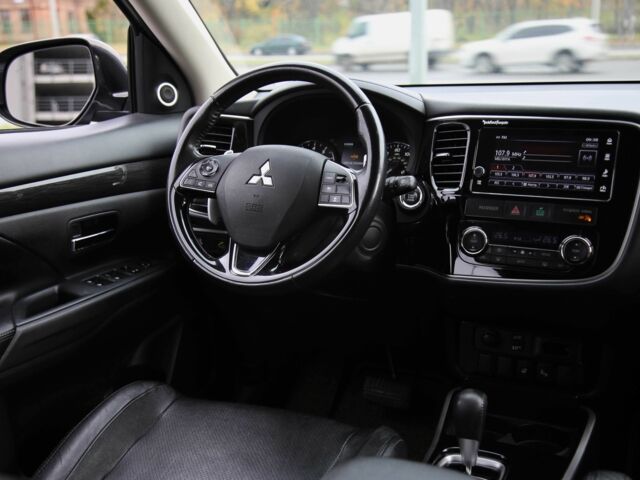 Серый Мицубиси Аутлендер, объемом двигателя 3 л и пробегом 195 тыс. км за 16900 $, фото 11 на Automoto.ua