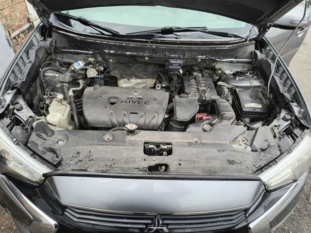 Сірий Міцубісі Аутлендер, об'ємом двигуна 2.4 л та пробігом 186 тис. км за 8800 $, фото 6 на Automoto.ua