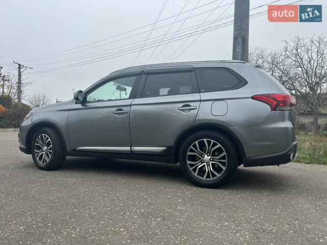 Серый Мицубиси Аутлендер, объемом двигателя 2.36 л и пробегом 85 тыс. км за 15500 $, фото 3 на Automoto.ua
