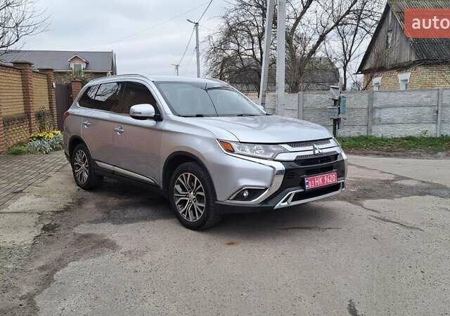 Серый Мицубиси Аутлендер, объемом двигателя 2.36 л и пробегом 120 тыс. км за 16100 $, фото 5 на Automoto.ua