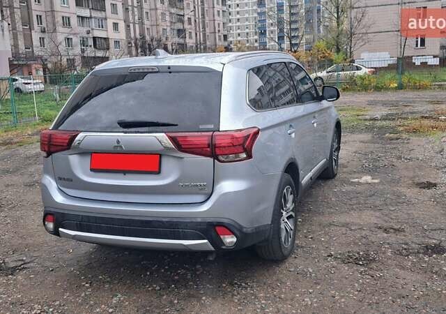 Серый Мицубиси Аутлендер, объемом двигателя 2.36 л и пробегом 120 тыс. км за 16100 $, фото 34 на Automoto.ua