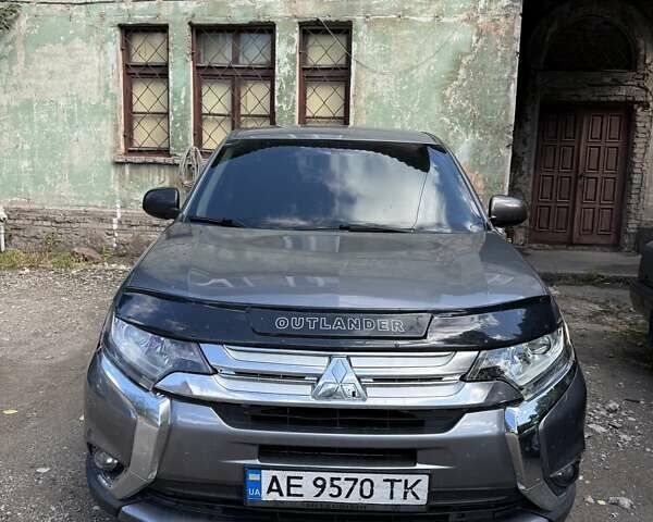 Серый Мицубиси Аутлендер, объемом двигателя 2.4 л и пробегом 162 тыс. км за 12950 $, фото 3 на Automoto.ua