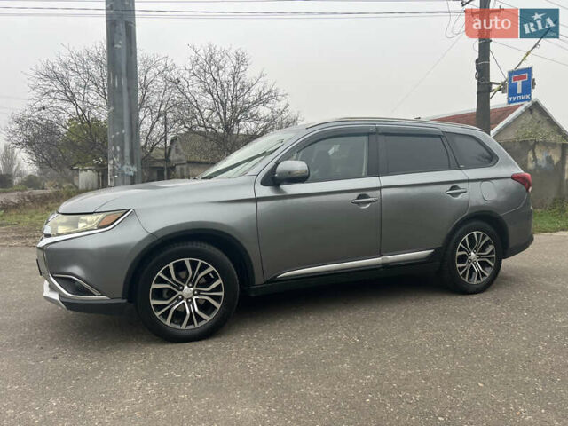 Серый Мицубиси Аутлендер, объемом двигателя 2.36 л и пробегом 85 тыс. км за 15500 $, фото 2 на Automoto.ua