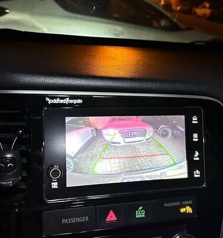 Серый Мицубиси Аутлендер, объемом двигателя 3 л и пробегом 130 тыс. км за 16750 $, фото 32 на Automoto.ua